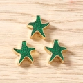 Dettaglio di ciondoli a stella marina in smalto verde per gioielli fai-da-te su legno - 10 Pezzi/Confezione / Verde