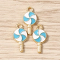 Close-up of three blue and white lollipop enamel charms with gold metal alloy loops - 10 Pieces Pack / Blue