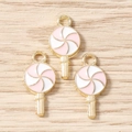 Detail of pink and white enamel lollipop pendants with gold finish for DIY jewelry making - 10 Pieces Pack / Pink