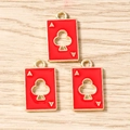 Macro shot of gold-plated Ace of Clubs playing card pendants with red enamel finish - 10 Pieces Pack / Red