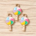 Macro detail of three colorful enamel lollipop pendants with gold alloy edges for DIY jewelry - 10 Pieces Pack / Colorful