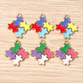 Detail of colorful puzzle heart charms with gold loops for DIY jewelry making - 10 Pieces Pack / Mixed Geometric Puzzle