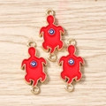 Detail of red turtle jewelry pendants with blue evil eye motifs for DIY crafts - 10 Pieces Pack / Red