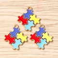 Macro shot of three colorful puzzle heart pendants on wood for DIY jewelry making - 10 Pieces Pack / Red Yellow Geometric Puzzle