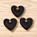 Detailed view of three heart-shaped black enamel alloy pendants for DIY jewelry making - 10 Pieces/Pack (2.0x1.9cm) / Black