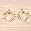 Detailed macro view of gold-plated Fu character charms with pink enamel accents for DIY jewelry - 10 Pieces Pack / Round Pink Fortune Firecracker