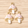 Detalle de colgantes de setas rosas con puntos y bordes dorados para bisutería DIY - Paquete de 10 / Rosa