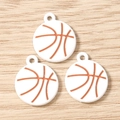 Detailed close-up of three basketball charm pendants for DIY jewelry making on wood - Basketball Shape Pendant / 10 Pieces Pack / White Brown