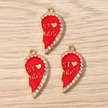 Detail of red and gold half-heart pendants with clear rhinestones and DIY loop - Red