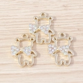 Set mit drei niedlichen Bärenanhängern, goldenen Hohlrahmen und Strass-Schleifen für DIY - Gold