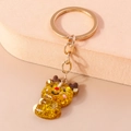 Cute reindeer keychain made of transparent resin with gold glitter and metal ring - Christmas Reindeer