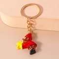 Glittering Santa Claus keychain with gold star and resin finish for Christmas decor - Christmas Elf