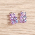 Close-up of translucent purple resin gummy bear charms with sparkling glitter and silver loops - 10 Pieces Pack / Purple