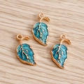 Three enamel maple leaf pendants in turquoise and gold for DIY jewelry making - Blue