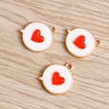 Detailed macro of three white enamel alloy heart pendants on a wooden background - 10 Pieces/Pack / White