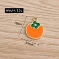 Detail view of persimmon enamel pendant charm with 19mm size and 1.2g weight specs - Persimmon
