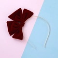 Elegant wine red velvet bow headband with a delicate gold metal frame on a bicolor backdrop - Wine Red Bowknot Headband