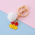 Christmas keychain with white pompom and yellow double bell charm on gold ring - Bell