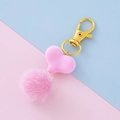 Portachiavi rosa con pompon di pelliccia e cuore, chiusura a moschettone dorata - Rosa