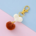 Portachiavi con cuore bianco e pompon marrone con chiusura a moschettone dorata - Arancione