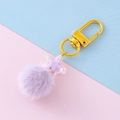 Star keychain with iridescent pendant and soft purple faux fur pompom ball - Purple