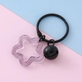 Hellvioletter transparenter Stern-Anhänger mit schwarzem Metallring und kleiner Glocke - Schwarz