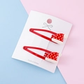 Pair of festive red Christmas hat resin BB clips on a white presentation card - Christmas Hat Shape / Hat BB Clip