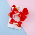Christmas bow hair clips featuring festive red grosgrain ribbon and Santa hat decoration - Christmas Hat Bow / Hat Bow Hair Clip