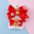 Red Christmas bow hair clips with reindeer and snowflake patterns on handmade card - Reindeer Bow / Elk Bow Hair Clip