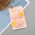 Set di due mollette BB in ecopelliccia rosa con piccoli fiori gialli in rilievo - Rosa