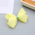 Lazo para el pelo hecho a mano en cinta grosgrain amarilla con purpurina azul - Amarillo