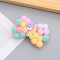 Pinza de pelo con lazo rosa de malla, pompones de colores y unicornio infantil - Unicornio Amarillo