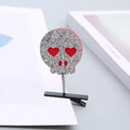 Sparkly silver sequin skull hair clip with red heart eyes for Halloween parties - Skull