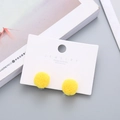 Cute yellow pom-pom earrings with 925 silver posts on a premium jewelry display card - Bright Yellow