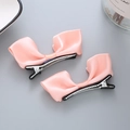 Paire de jolies barrettes à nœuds en satin rose avec pinces crocodiles pour filles - Chair