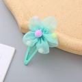 Barrette à cheveux fleur en résille vert menthe avec pompon violet et clip en métal - Bleu Lac