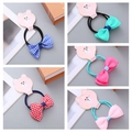 Detailed view of handmade bow hair ties for girls with floral patterns and high elastic bands - Plain Plaid Style