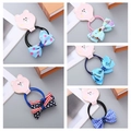 Detail view of 5 sets of handmade printed bow hair ties with elastic bands for girls - Blue Series