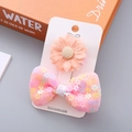 Set of 2 girls' hair clips with peach fabric daisy and sequined pink mesh bow - Pink