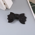 Halloween kids hair clip featuring a black sequin bat wing bow with glitter finish - Black Bow
