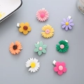 Set of 9 colorful matte flower hair clips for girls in cute pastel shades and daisy shapes - Random Flower