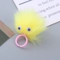 Cute yellow plush monster ring for kids featuring fluffy pompom and big eyes design - Yellow