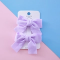 Set of two purple handmade ribbon bow hair clips for girls on a display card - Violet