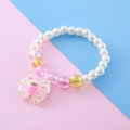 Kinderarmband mit Kunstperlen, bunten Perlen und gelbem Erdbeerschleifen-Anhänger - Weiß