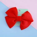 Fermaglio per capelli con fiocco rosso per bambine su cartoncino decorato con stelle - Rosso