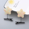Glittery star spring hair clips for girls in colorful macallon style with black metal base - Glitter Star Yellow