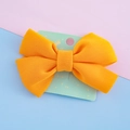 Fermaglio per capelli con fiocco giallo vivace per bambine su carta decorativa - Giallo Zenzero