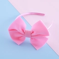 Diadema rosa con lazo grande y acabado satinado mate para niñas pequeñas - Rosa