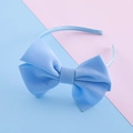 Sweet oversized light blue bow headband for girls featuring a ribbed grosgrain texture - Blue