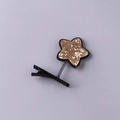 Cute star spring hair clip featuring gold sequins and black metal alligator base - Sequin Flower Gold